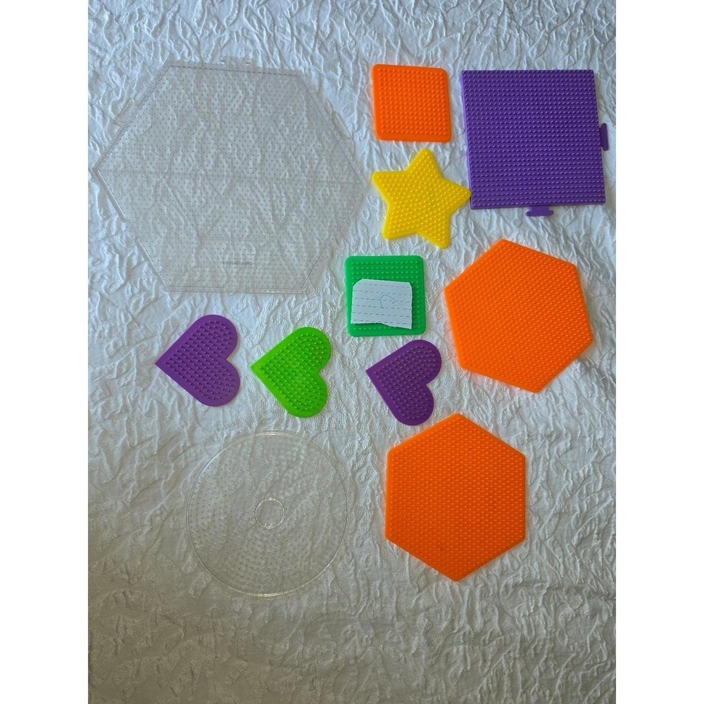 Lot C Perler bead pegboards in various shapes and bright colors